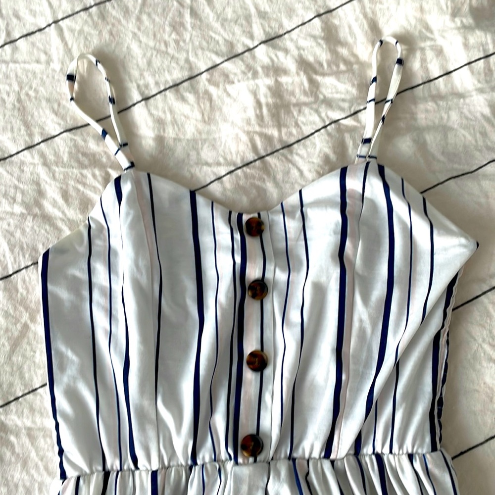 Adorable striped dress. Mid length. Perfect for warmer weather.